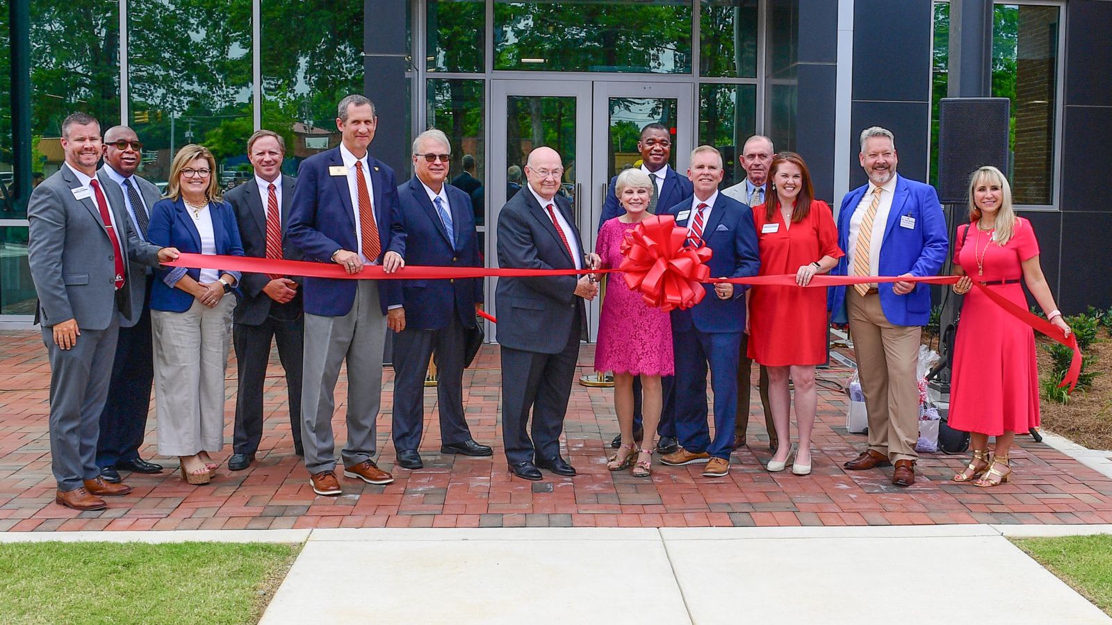 Members of the Alabama Community College Board of Trustees and the Gadsden State Executive Cabinet at the ribbon cutting for the AMC