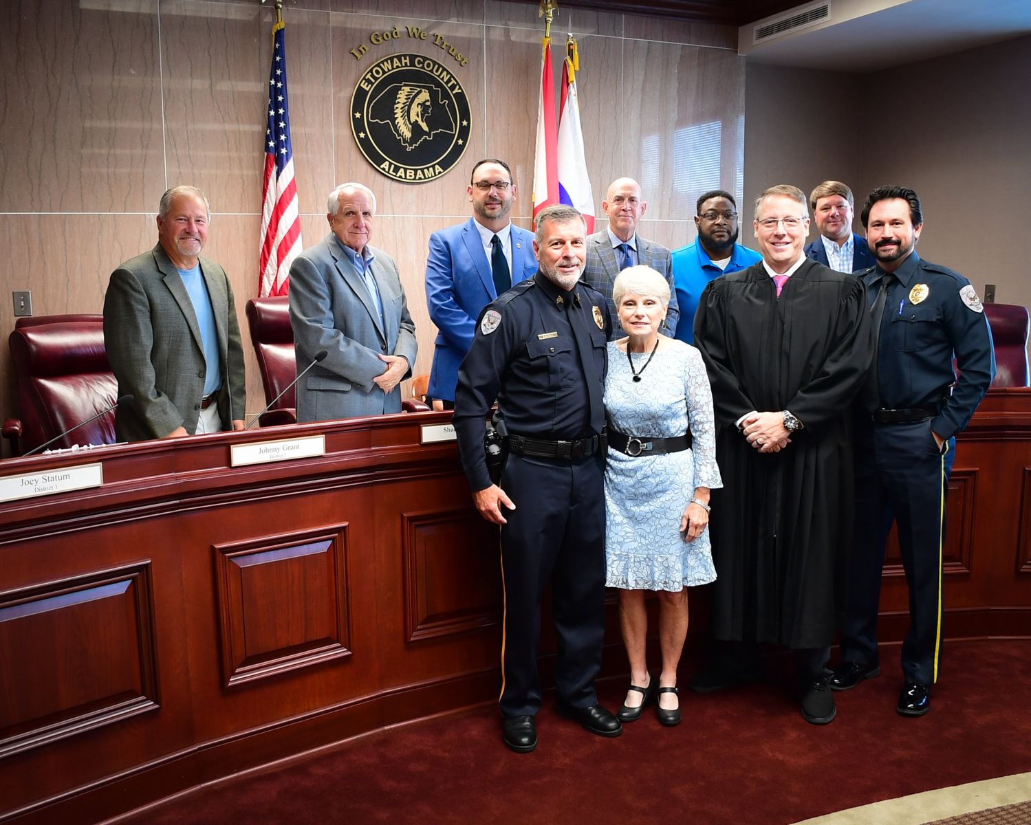 Sgt. David Bankson, Gadsden State President Dr. Kathy Murphy, Probate Judge Scott Hassell and GSCC Chief of Police Jay Freeman with the Etowah County Commission after Bankson’s swearing-in. 