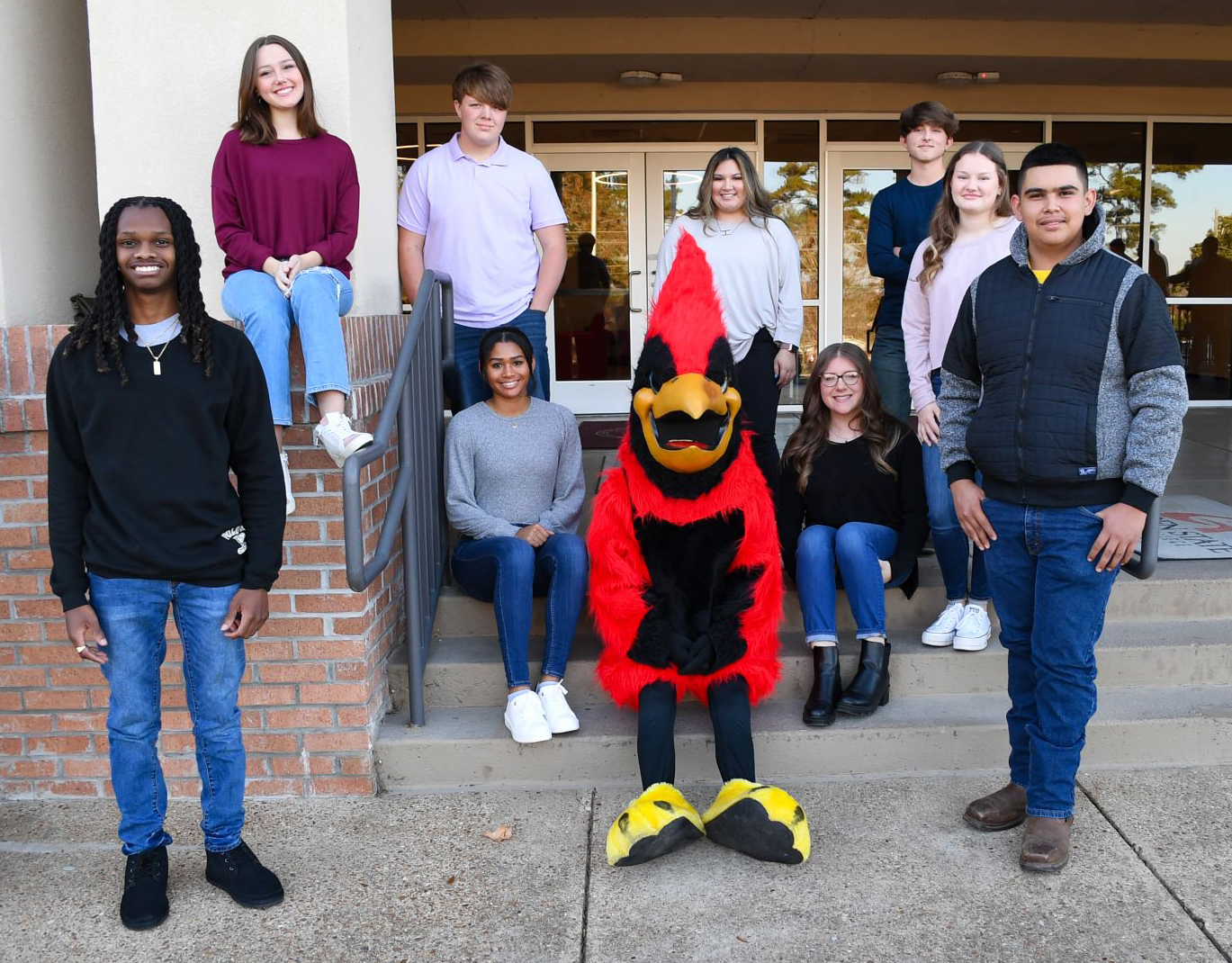 Dual enrollment students with GSCC mascot Swoop