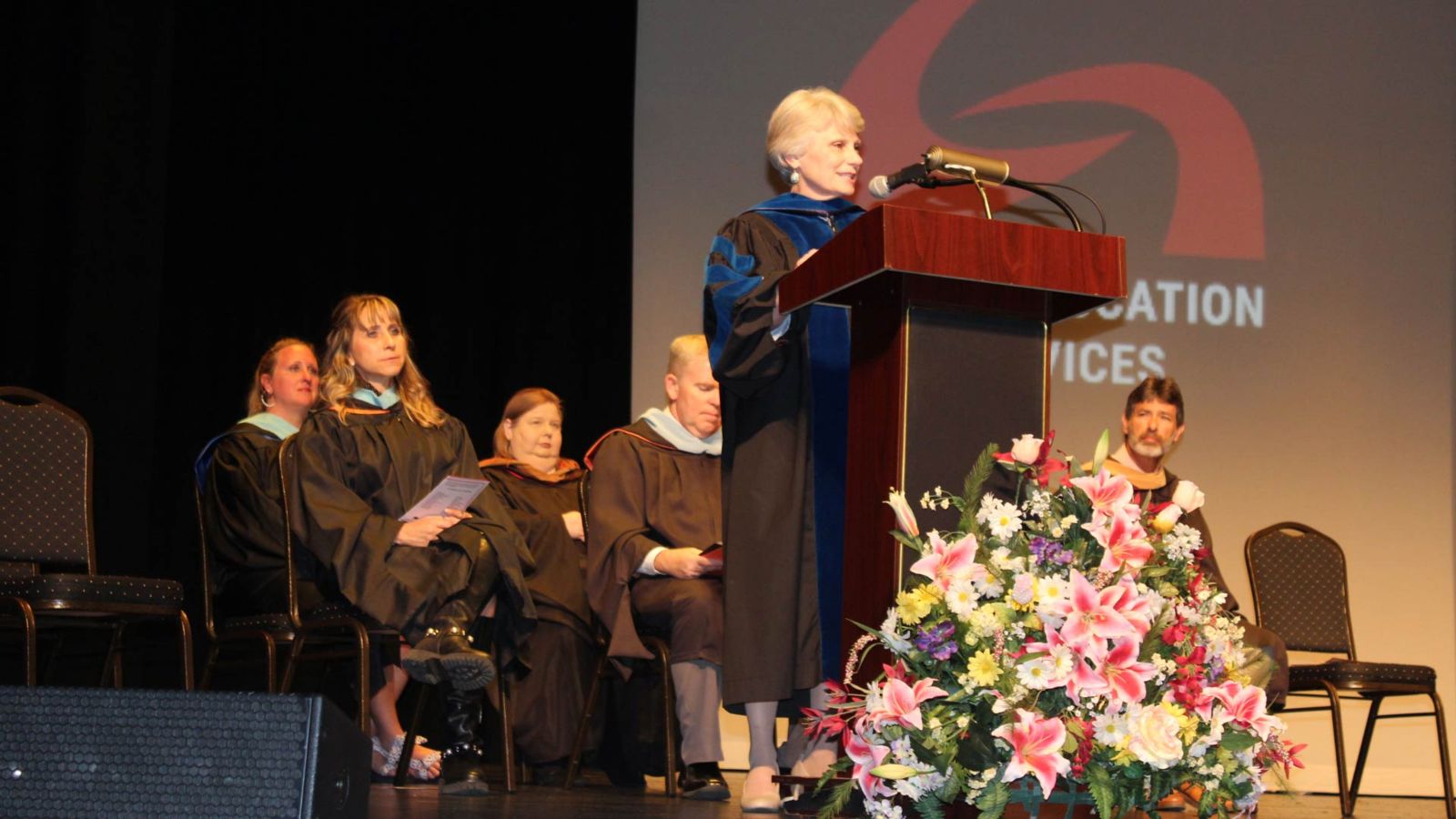 Dr. Kathy Murphy speaks to the graduates and audience during a ceremony held April 11 at the Oxford Performing Arts Center