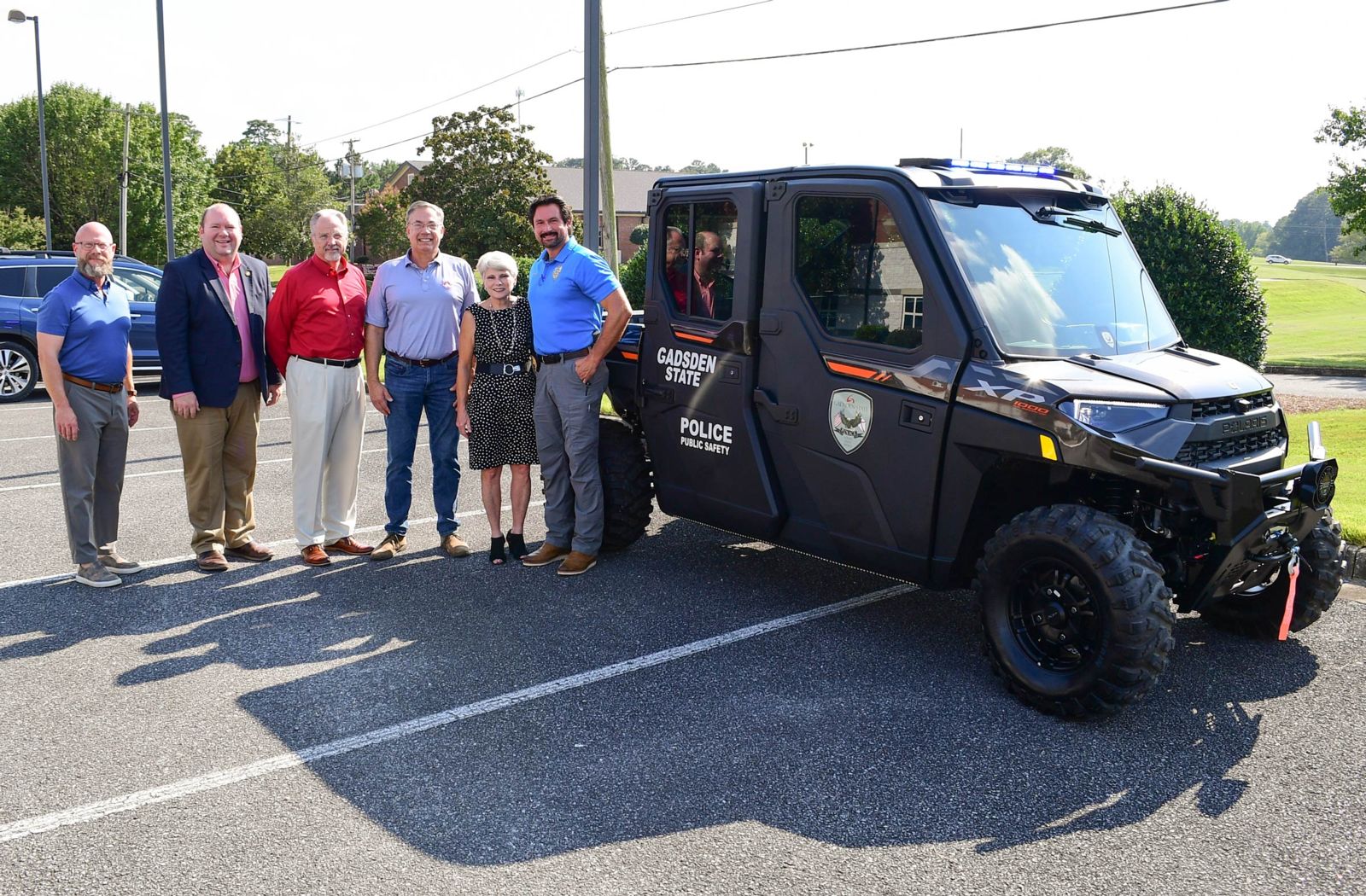 Representative Craig Lipscomb, State Senator Andrew Jones, Representatives Mark Gidley and Mack Butler, Gadsden State President Dr. Kathy Murphy and GSCC Chief of Police Jay Freeman with the Polaris Ranger NorthStar/Police Edition purchased with funds from a community development grant.