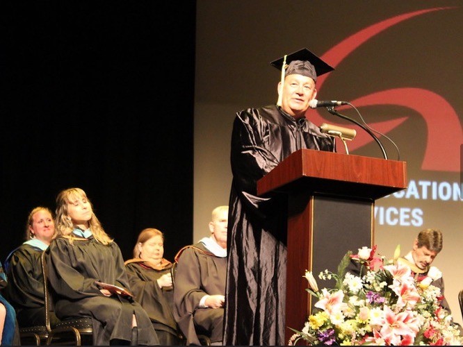 Tracy Hutcheson speaks at the recent Adult Education Graduation, where he received his high school diploma.
