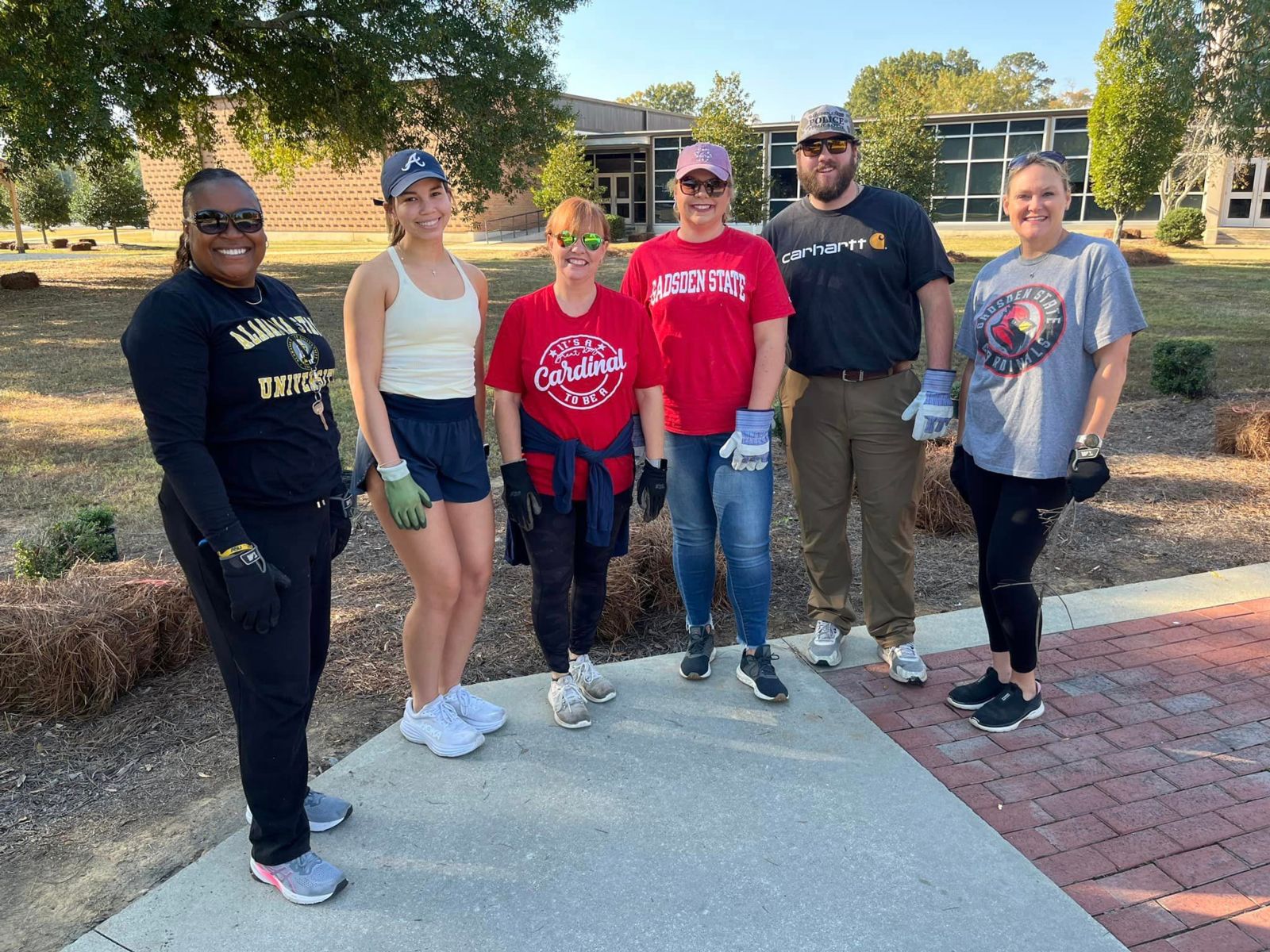 Members of Phi Theta Kappa Honor Society and the Gadsden State Alumni Association participate in Clean-Up Day 